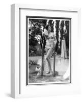 Young Woman in an Abstract Print Bikini with Broderie Anglaise Trim Towel Dries Her Hair-null-Framed Art Print