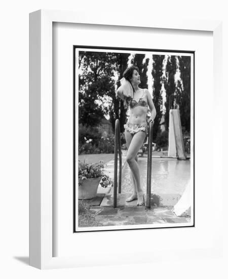 Young Woman in an Abstract Print Bikini with Broderie Anglaise Trim Towel Dries Her Hair-null-Framed Art Print