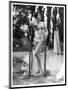 Young Woman in an Abstract Print Bikini with Broderie Anglaise Trim Towel Dries Her Hair-null-Mounted Art Print