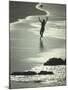 Young Woman in Silhouette Running Along Beach at Twilight Throwing Beach Ball Up in the Air-Co Rentmeester-Mounted Photographic Print