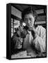 Young Woman Inserting Mother-Of-Pearl Bead into Live Oyster at Pearl Factory-Alfred Eisenstaedt-Framed Stretched Canvas