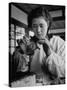 Young Woman Inserting Mother-Of-Pearl Bead into Live Oyster at Pearl Factory-Alfred Eisenstaedt-Stretched Canvas