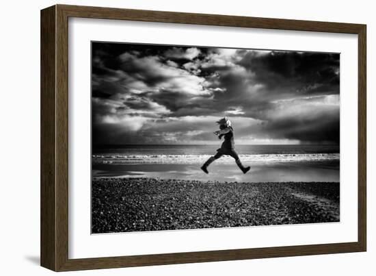 Young Woman Jumping on Beach-Rory Garforth-Framed Photographic Print