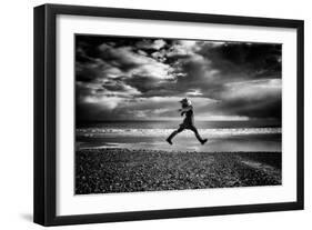 Young Woman Jumping on Beach-Rory Garforth-Framed Photographic Print