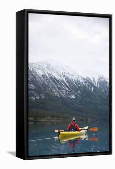 Young Woman Kayaking on Chilko Lake in British Columbia, Canada-Justin Bailie-Framed Stretched Canvas