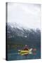 Young Woman Kayaking on Chilko Lake in British Columbia, Canada-Justin Bailie-Stretched Canvas
