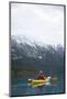 Young Woman Kayaking on Chilko Lake in British Columbia, Canada-Justin Bailie-Mounted Photographic Print