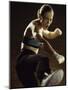 Young Woman Kickboxing-null-Mounted Photographic Print