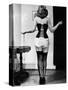 Young Woman Lacing Her Corset-Bettmann-Stretched Canvas