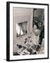 Young Woman Looking at Magazines-Philip Gendreau-Framed Photographic Print