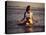 Young Woman Meditating at the Beach-null-Stretched Canvas
