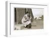 Young Woman on Doorstep with Puppy-null-Framed Photographic Print