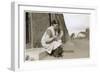 Young Woman on Doorstep with Puppy-null-Framed Photographic Print