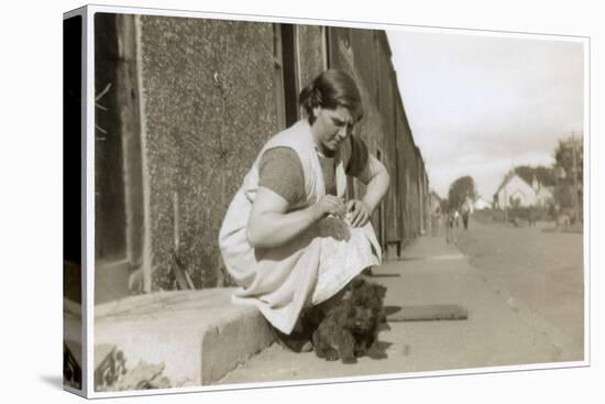 Young Woman on Doorstep with Puppy-null-Stretched Canvas