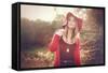 Young Woman Outdoors Wearing a Red Hat-Sabine Rosch-Framed Stretched Canvas