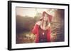 Young Woman Outdoors Wearing a Red Hat-Sabine Rosch-Framed Photographic Print