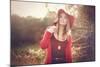 Young Woman Outdoors Wearing a Red Hat-Sabine Rosch-Mounted Photographic Print