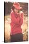 Young Woman Outdoors Wearing a Red Hat-Sabine Rosch-Stretched Canvas