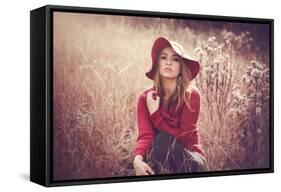 Young Woman Outdoors Wearing a Red Hat-Sabine Rosch-Framed Stretched Canvas