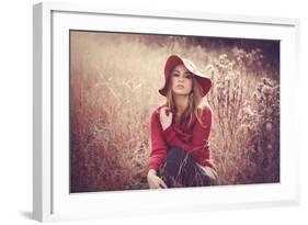 Young Woman Outdoors Wearing a Red Hat-Sabine Rosch-Framed Photographic Print