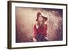 Young Woman Outdoors Wearing a Red Hat-Sabine Rosch-Framed Photographic Print