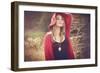 Young Woman Outdoors Wearing a Red Hat-Sabine Rosch-Framed Photographic Print