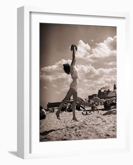 Young Woman Playing Ball on Beach-Philip Gendreau-Framed Photographic Print