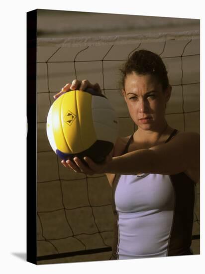 Young Woman Playing Beach Volleyball-null-Stretched Canvas