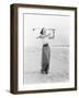 Young Woman Playing Golf at the Beach-null-Framed Photo