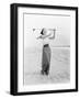 Young Woman Playing Golf at the Beach-null-Framed Photo