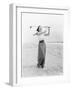 Young Woman Playing Golf at the Beach-null-Framed Photo