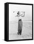 Young Woman Playing Golf at the Beach-null-Framed Stretched Canvas