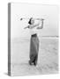 Young Woman Playing Golf at the Beach-null-Stretched Canvas