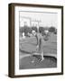 Young Woman Playing Mini Golf-null-Framed Photo