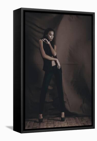 Young Woman Posing in Studio-Luis Beltran-Framed Stretched Canvas