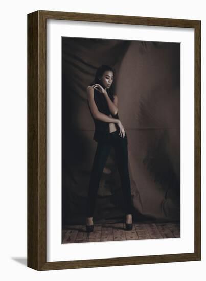 Young Woman Posing in Studio-Luis Beltran-Framed Photographic Print