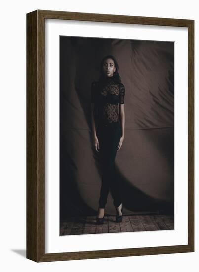 Young Woman Posing in Studio-Luis Beltran-Framed Photographic Print