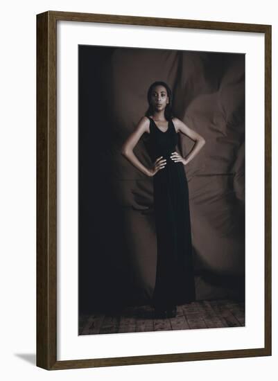 Young Woman Posing in Studio-Luis Beltran-Framed Photographic Print