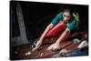 Young Woman Practicing Rock-Climbing on a Rock Wall Indoors-NejroN Photo-Stretched Canvas