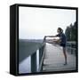 Young Woman Prepares for Jogging-Aaron McCoy-Framed Stretched Canvas