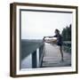 Young Woman Prepares for Jogging-Aaron McCoy-Framed Photographic Print