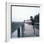 Young Woman Prepares for Jogging-Aaron McCoy-Framed Photographic Print