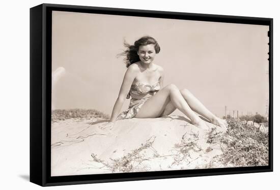 Young Woman Seated on Sand Dune-Bettmann-Framed Stretched Canvas