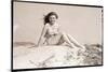 Young Woman Seated on Sand Dune-Bettmann-Mounted Photographic Print