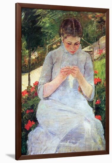 Young Woman Sewing In The Garden-Mary Cassatt-Framed Art Print