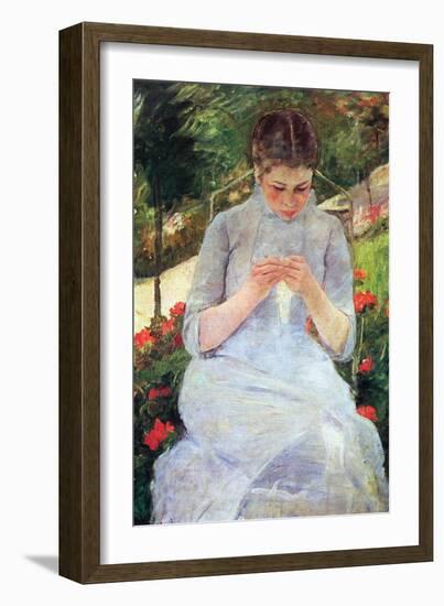 Young Woman Sewing In The Garden-Mary Cassatt-Framed Art Print