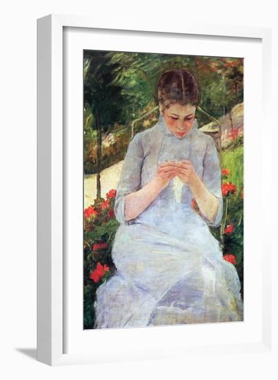 Young Woman Sewing In The Garden-Mary Cassatt-Framed Art Print