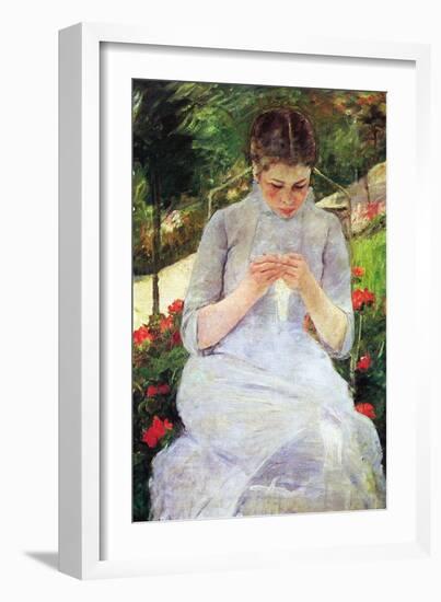 Young Woman Sewing In The Garden-Mary Cassatt-Framed Art Print