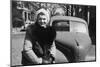 Young Woman Sits on Bumper of Her Car, Ca. 1942-null-Mounted Photographic Print