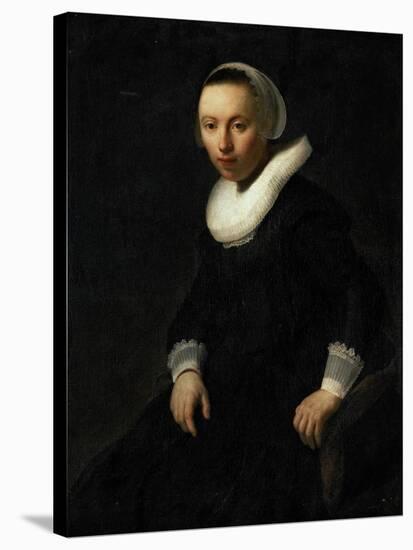 Young Woman Sitting in a Chair-Rembrandt van Rijn-Stretched Canvas